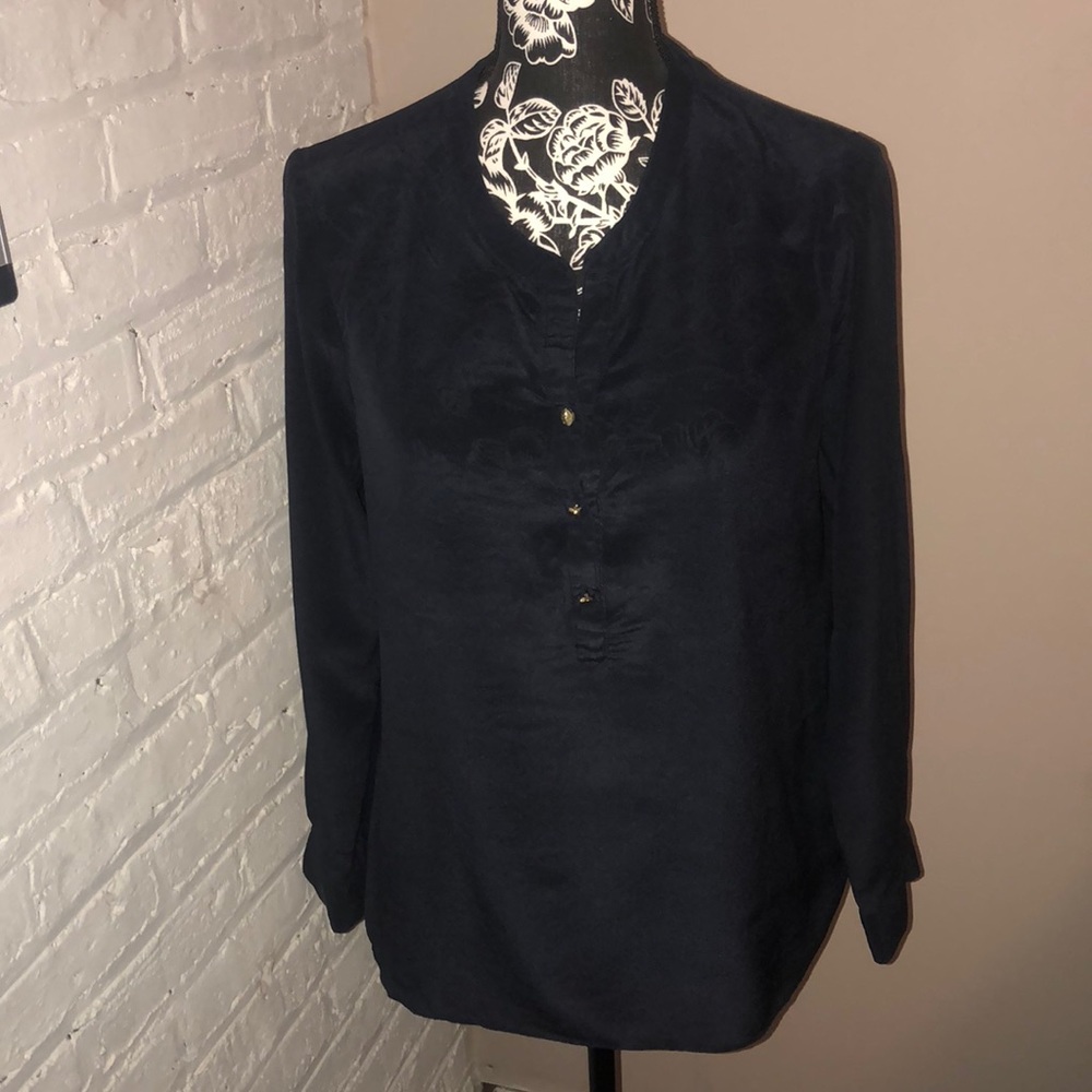 3 women’s used dress shirts all in good condition